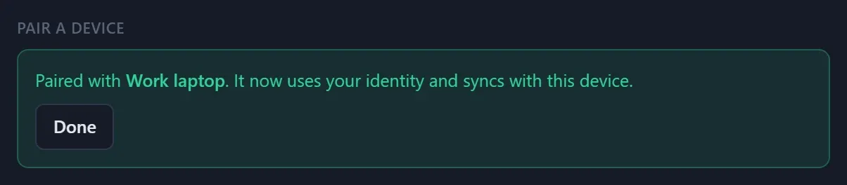 Confirmation: Paired with Work laptop.
